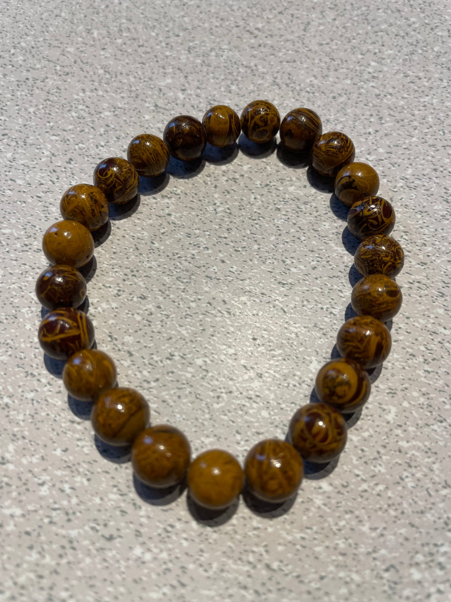 Bracelet en bois pétrifié (billes 8mm)