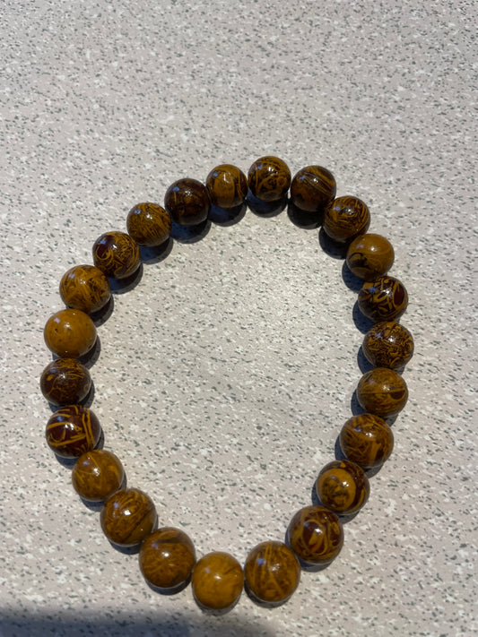 Bracelet en bois pétrifié (billes 8mm)